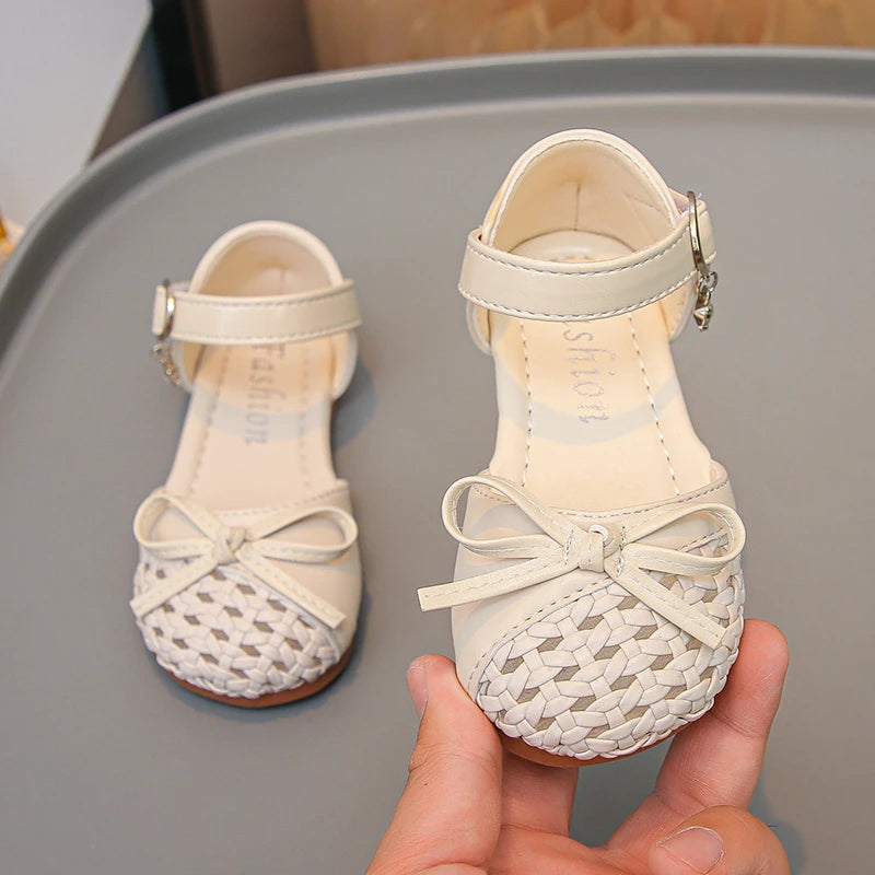 Summer Girl Causal Sandals 2026 New Bowknot Kids Solid Color Woven Sandals Hollow-out Simple Children Sweet School Flat Sandals - Sun Studio