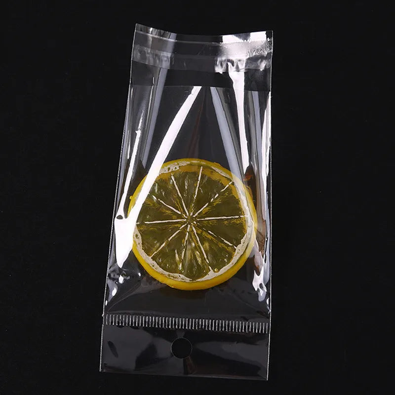 100 transparent plastic hanging self-adhesive bags, OPP self sealing bags, jewelry candy bags, gift biscuit sales bags - Sun Studio