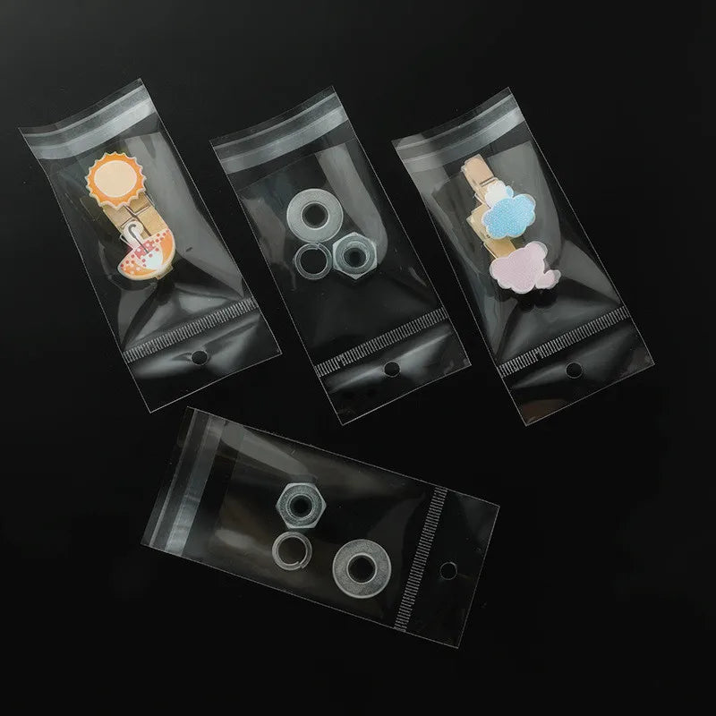 100 transparent plastic hanging self-adhesive bags, OPP self sealing bags, jewelry candy bags, gift biscuit sales bags - Sun Studio
