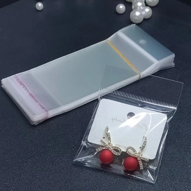 100 transparent plastic hanging self-adhesive bags, OPP self sealing bags, jewelry candy bags, gift biscuit sales bags - Sun Studio